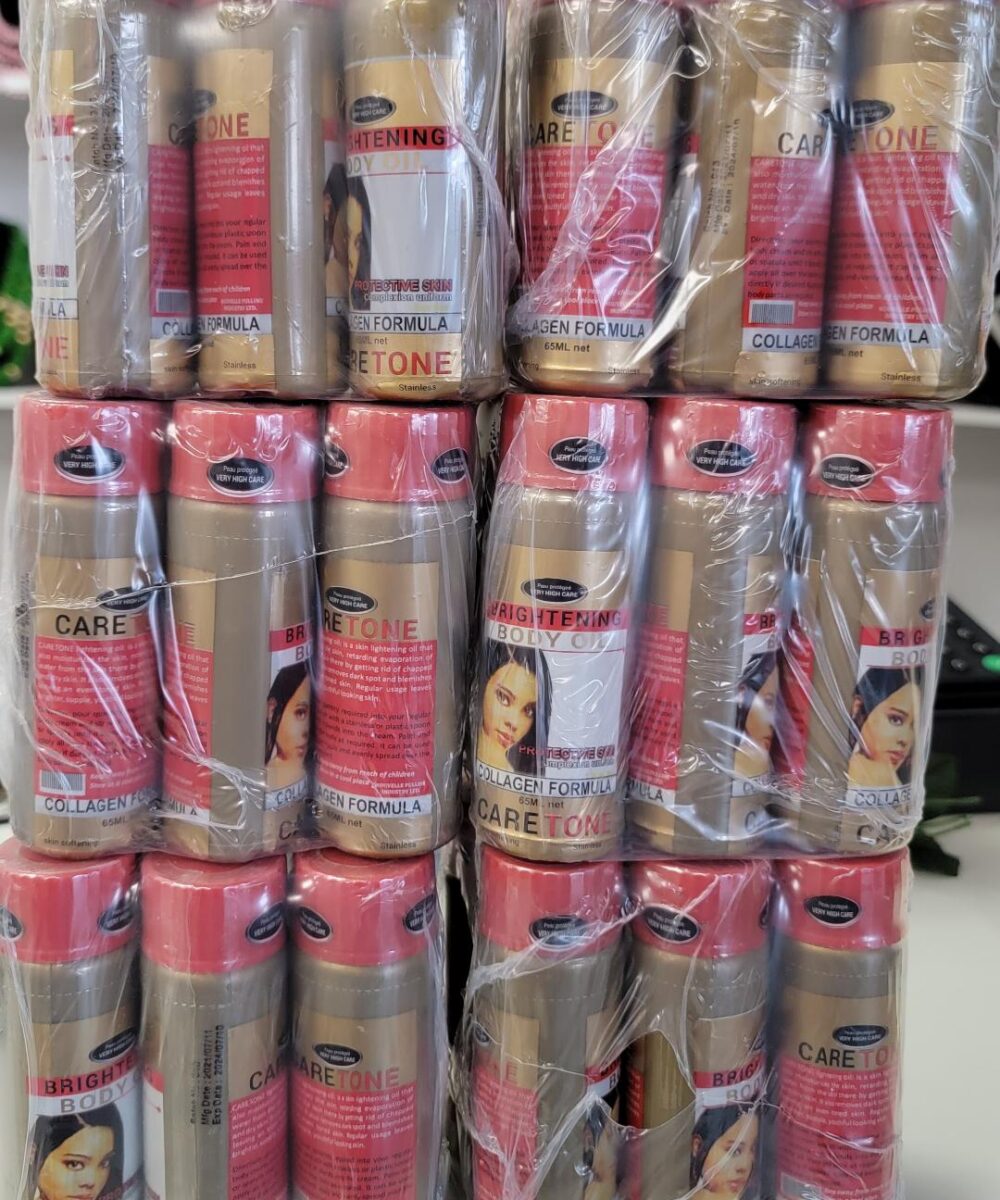 24 Pic Caretone lightening Body Oil